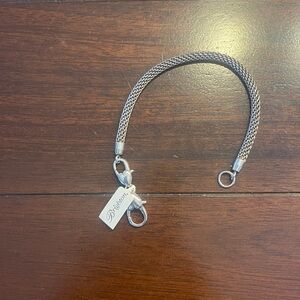 NWT Brand new, never worn Brighton Beverly Glam Silver charm bracelet. 8inches